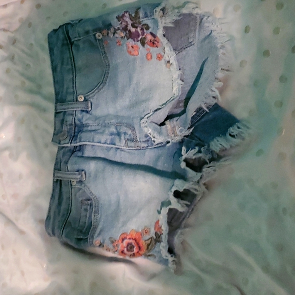 Ripped jean shorts